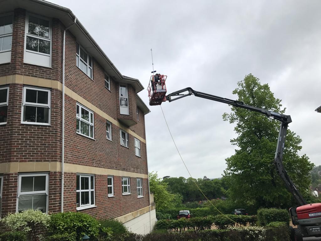 rain gutter cleaning with machinery for town houses