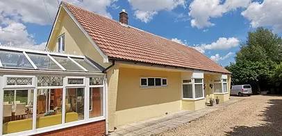 gutter cleaning for a yellow brick bungalow